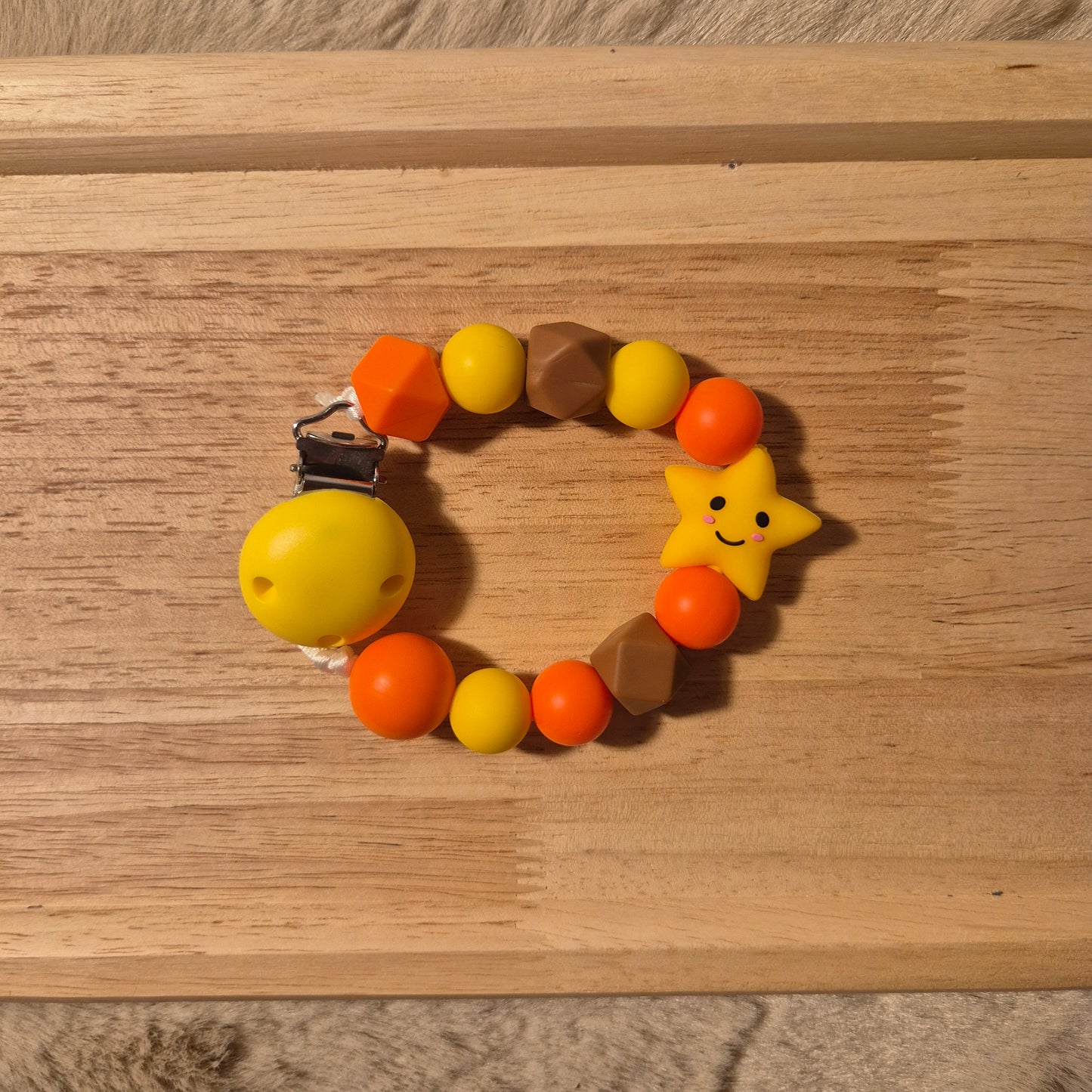 Schnullerkette Stern 3D | Orange Gelb Braun