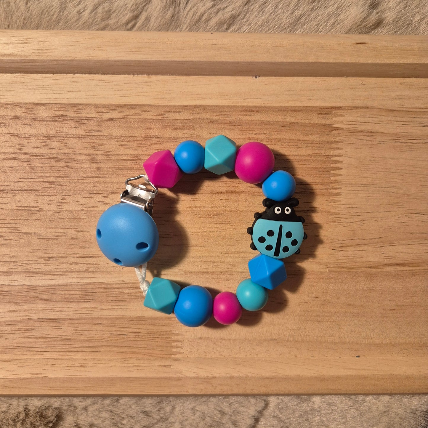 Schnullerkette Marienkäfer | Türkis Blau Pink