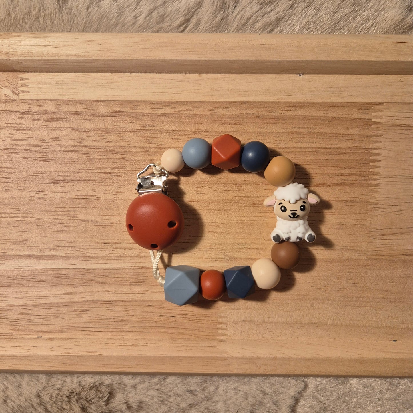 Schnullerkette Schäfchen 3D | Terakotta Blau Braun